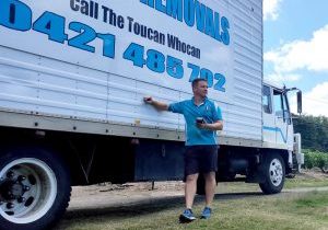 Toucan Removals & Storage Mover Mark With Moving Truck